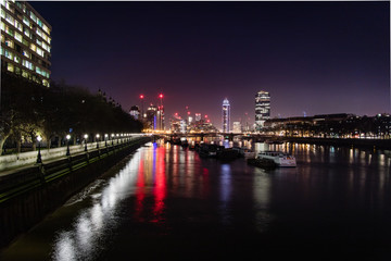 Fototapeta na wymiar The Thames lit up at night