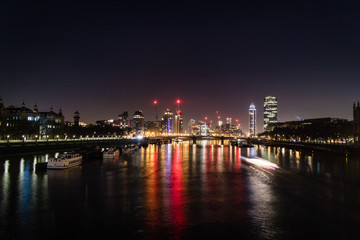 Fototapeta na wymiar The Thames lit up at night