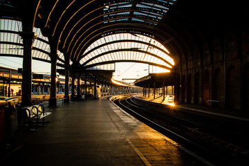The inside of York train station in the evening.