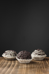Chocolate protein balls (nut candies with sesame seeds)