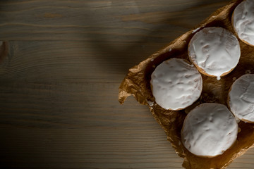 Cooking cake and cookies with white chocolate glaze recipe. Flat top view, from above.