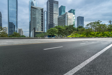 Fototapeta na wymiar empty asphalt road front of modern buildings.
