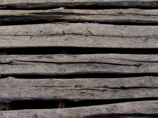 Texture background of old rotten wooden boards