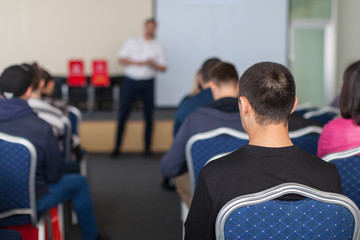 The image of a conference in a conference hall