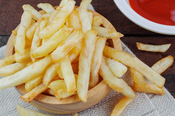 French fries on wooden.