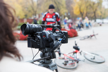 The videographer takes off cyclists
