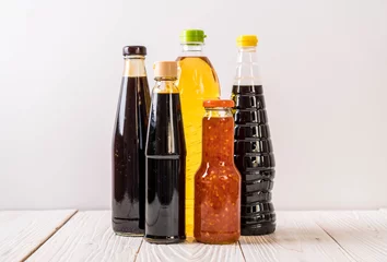Fotobehang group of sauce bottle condiment for cooking © topntp
