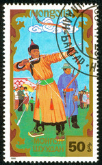 Ukraine - circa 2018: A postage stamp printed in Mongolia shows Archery, Traditional Mongolian sport. Series: Sports. Circa 1988.