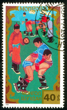 Ukraine - circa 2018: A postage stamp printed in Mongolia shows Wrestling, Traditional Mongolian sport. Series: Sports. Circa 1988.