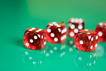 playing poker dice on green background