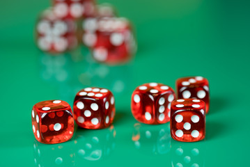 playing poker dice on green background