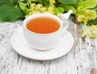 cup of herbal tea with linden flowers
