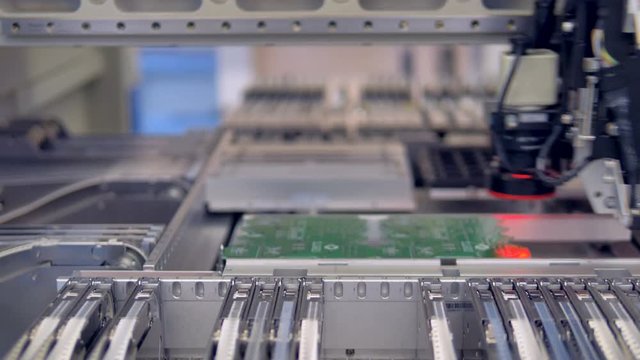Electronics contract manufacturing. PCB circuit chip production process. 4K.