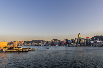 Naklejka premium Victoria Harbor of Hong Kong at twilight