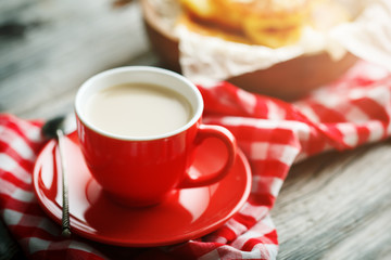 Delicious pancakes on wooden table with Cup of coffee and jam
