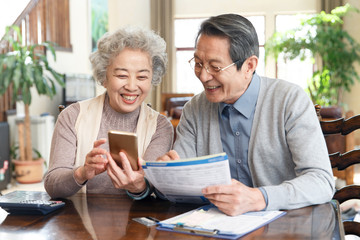 Elderly couples are managing finances