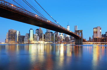 New York City at night with Brooklyn bridge