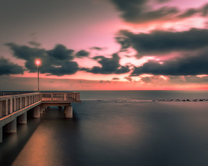 Fototapeta na wymiar sea walkway sunset