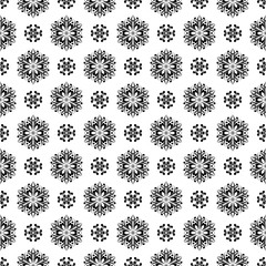 Black floral seamless pattern on white background