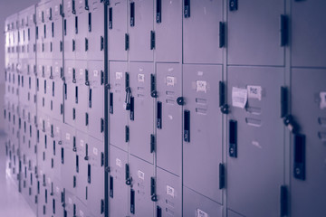 Filing cabinets in office building - violet color tone