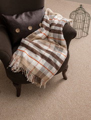 modern armchair and blanket
