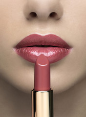 Obraz premium face close up mouth with beautiful lipstick