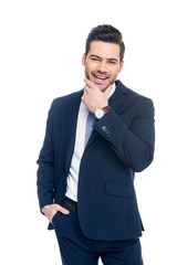 handsome cheerful businessman in suit, isolated on white