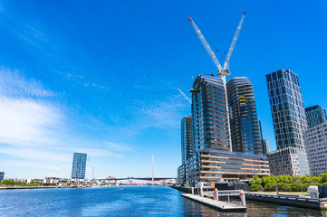 Fototapeta na wymiar Panoramic view of construction of luxury apartment buildings with water view