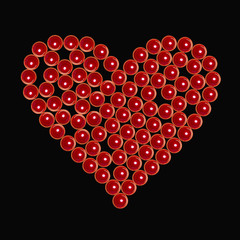 red valentine candles as heart at black