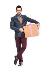 handsome beardman holding gift box, isolated on white