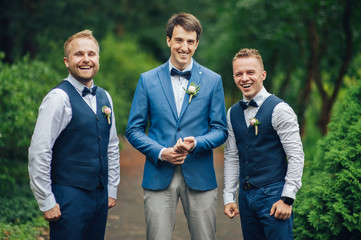 Happy groom and groomsmen