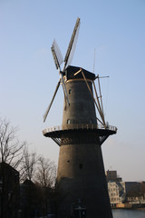 Windmill along river Schie in the city of Schiedam, The Netherlands