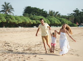 Smiling family outdoors