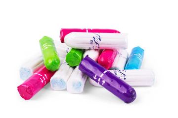 A new soft tampon with blue string to absorb menstrual blood isolated on white background