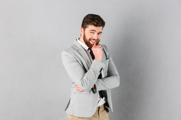 Portrait of a smiling businessman dressed in suit