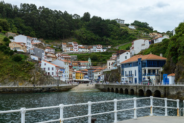 Fototapeta na wymiar fishing town at the foot of the mountain