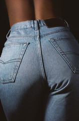 Sexy perfect female buttocks in jeans denim