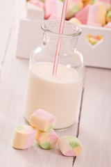 Marshmallows on wooden table. 