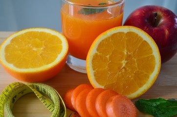 Lose weight, fresh fruits and a tape measure.