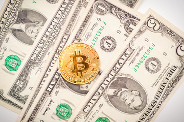 Bitcoin with money on white background