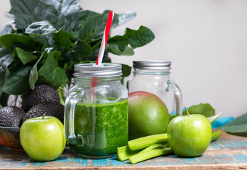 Fresh green vegetables and fruits, ingredients for dietary healthy green detox smoothie or salad