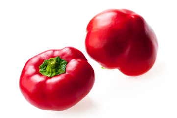 sweet red peppers isolated on white background