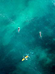Obraz na płótnie Canvas Surfing in Bali. Ocean, waves. Taken from the top.