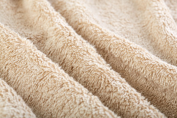 fabric and texture concept - close up of a towel terry cloth or terry textile background