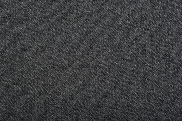 knitted woolen fabric texture, abstract background. Close-up of jersey fabric textured cloth background. Close up on crumpled gray material texture fabric. Grey textile pattern as a background.