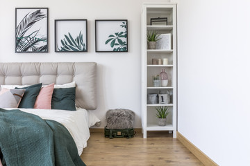 Gallery in green bedroom interior