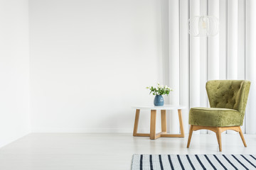 White living room with armchair