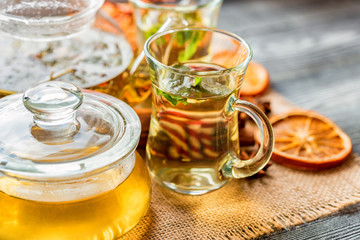 Herbal Christmas tea with honey and mint leaves