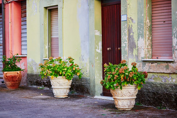 Fototapeta na wymiar Colorful houses on a street of Bosa, Sardinia, Italy