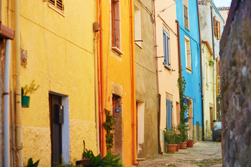 Fototapeta na wymiar Colorful houses on a street of Bosa, Sardinia, Italy